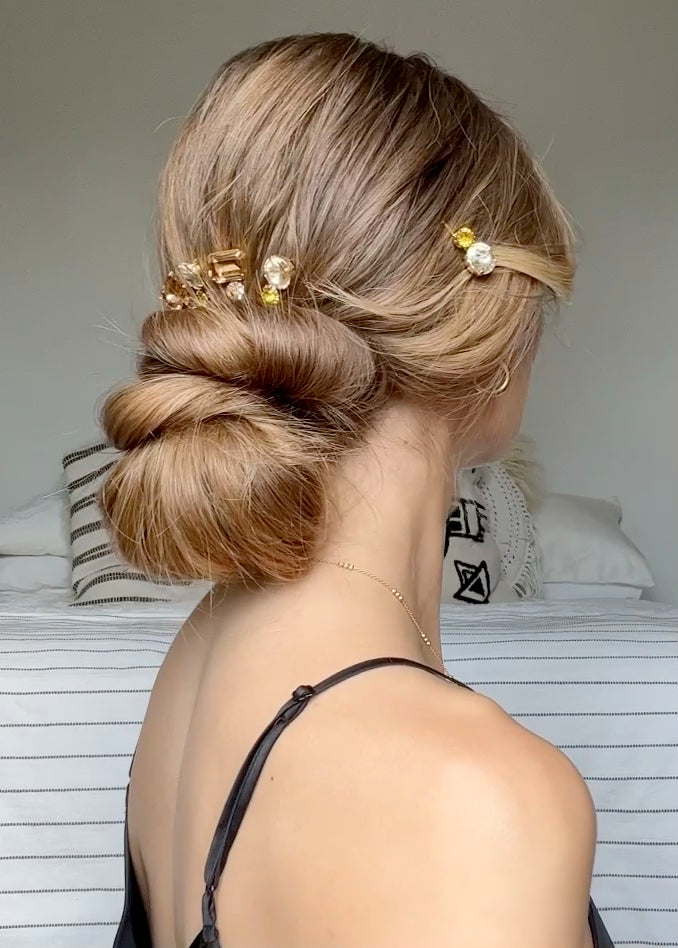Low Bun Adorned with Crystals